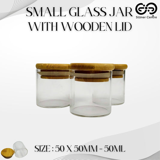 GLASS JAR | SMALL GLASS JAR WITH WOODEN LID SIZE: 50 x 50MM - 50ML