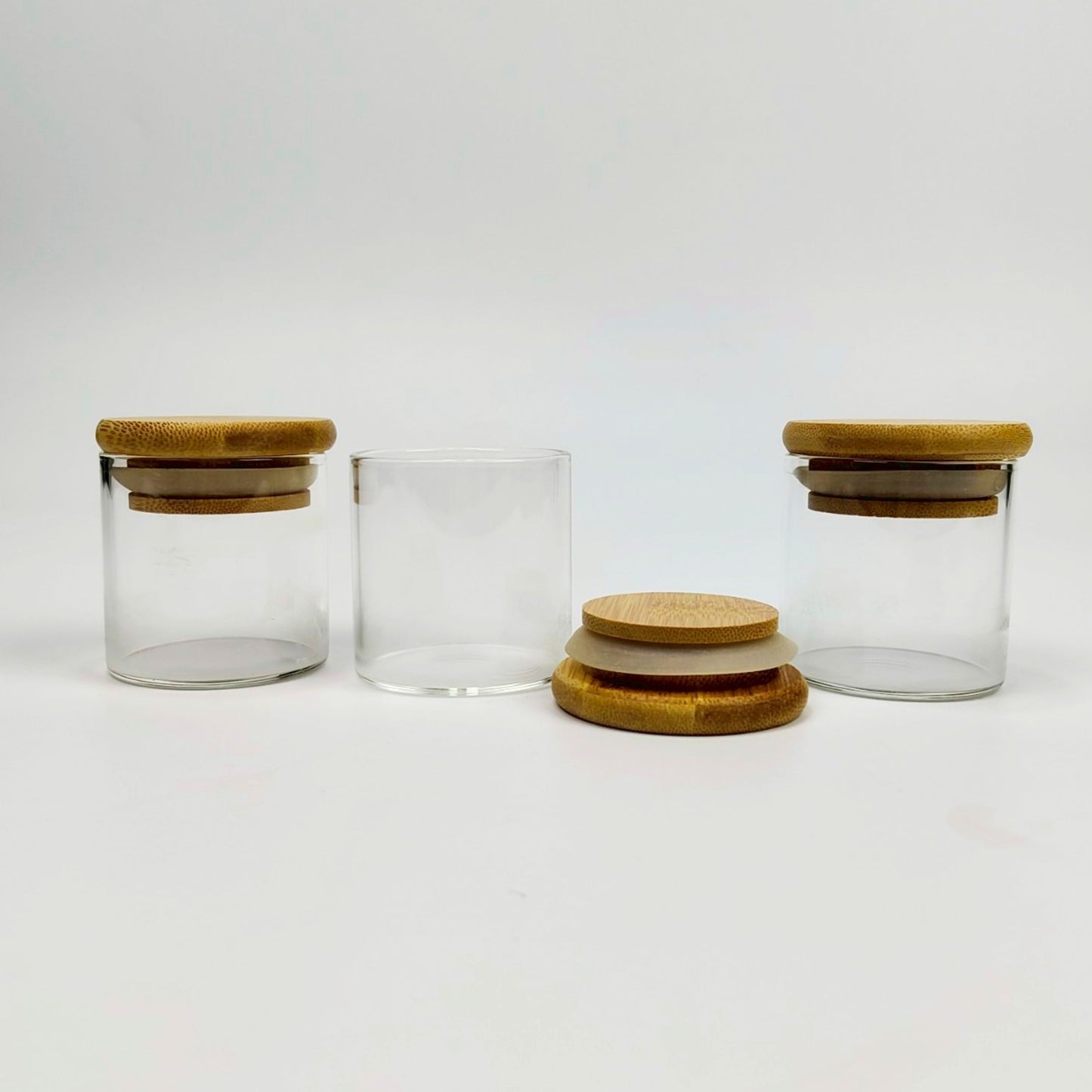GLASS JAR | SMALL GLASS JAR WITH WOODEN LID SIZE: 50 x 50MM - 50ML