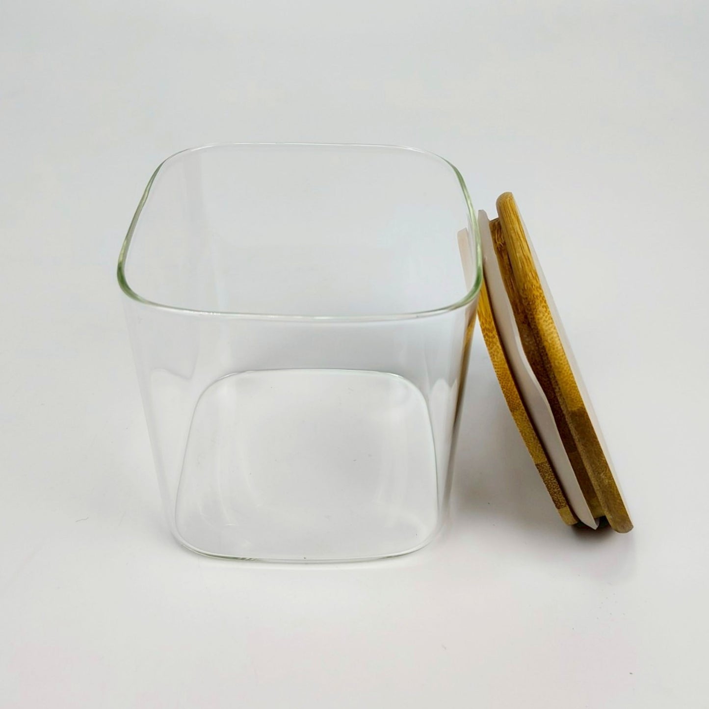 GLASS JAR | SQUARE GLASS JAR WITH WOODEN LID SIZE: 100 x 100MM - 700ML