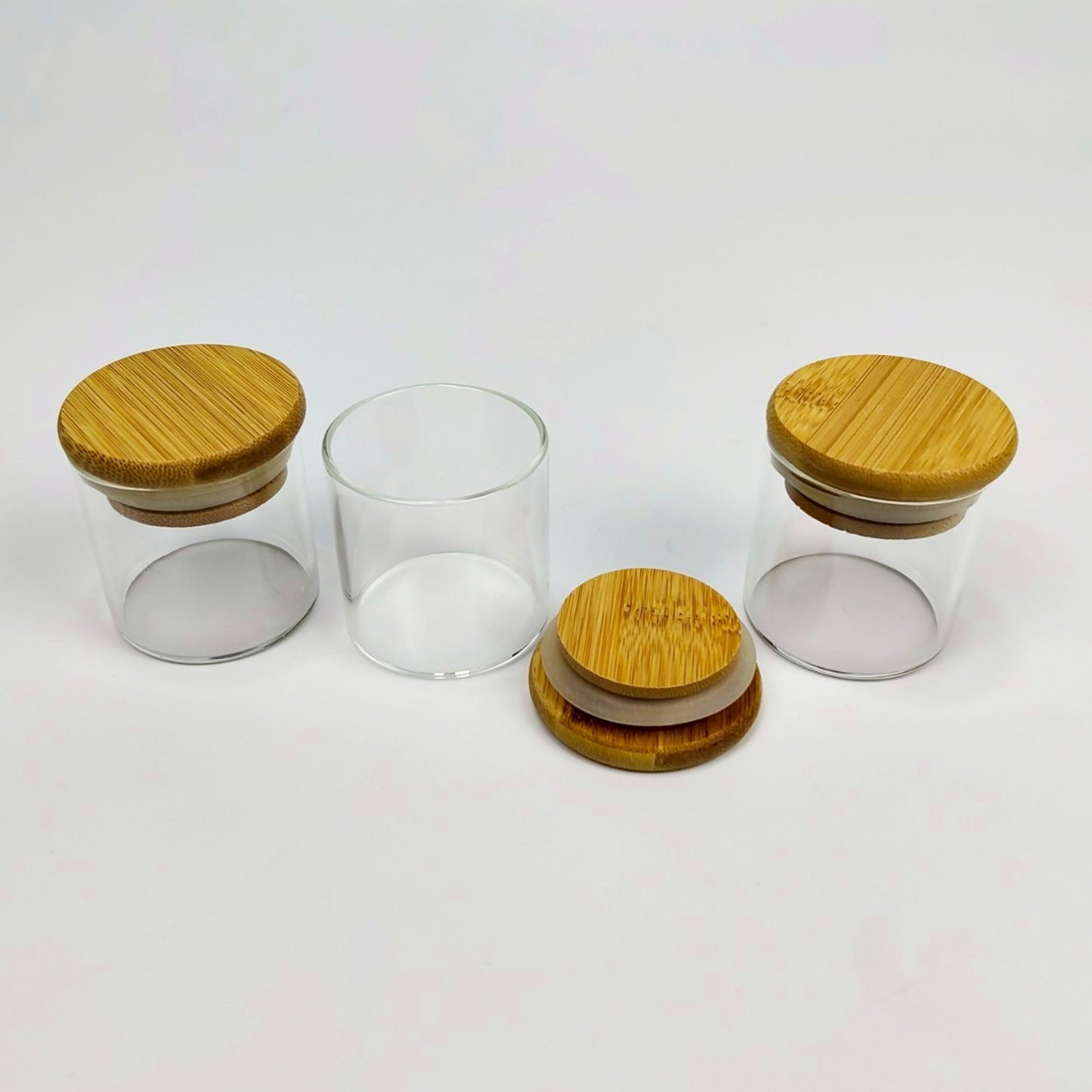 GLASS JAR | SMALL GLASS JAR WITH WOODEN LID SIZE: 50 x 50MM - 50ML