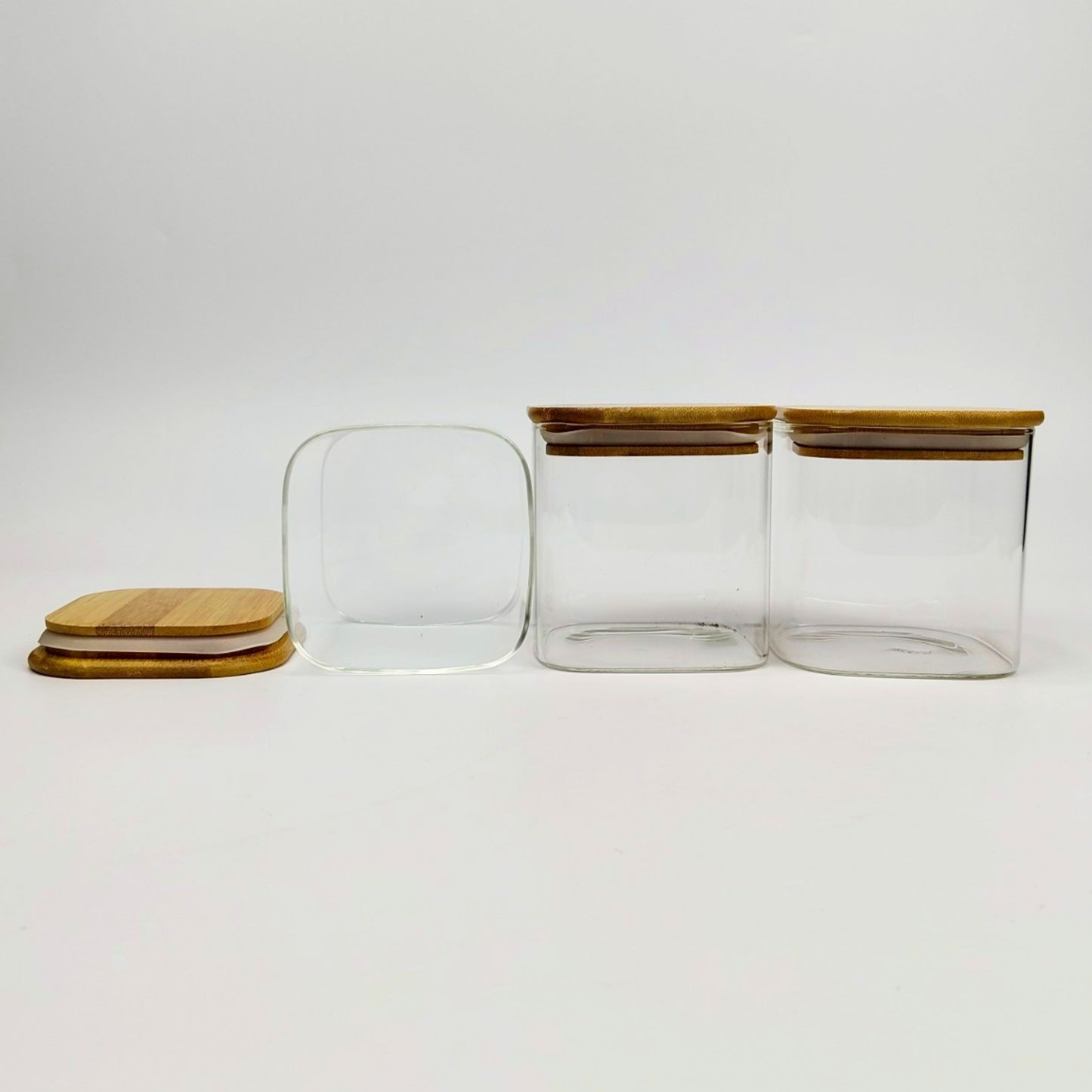 GLASS JAR | SQUARE GLASS JAR WITH WOODEN LID SIZE: 100 x 100MM - 700ML