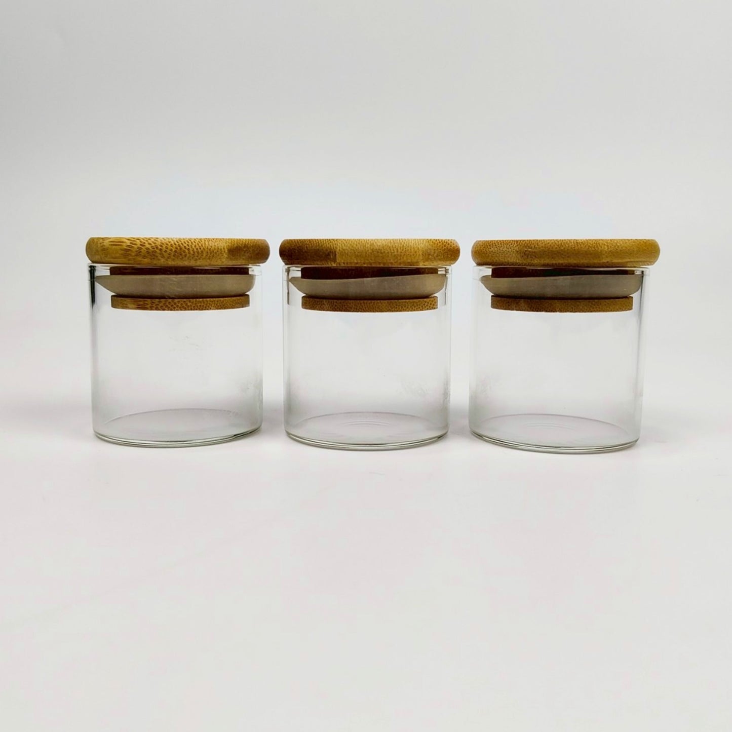 GLASS JAR | SMALL GLASS JAR WITH WOODEN LID SIZE: 50 x 50MM - 50ML